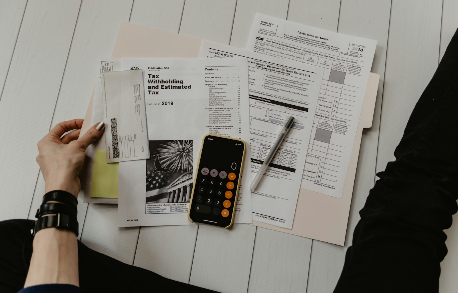 Household bills and tax paperwork being reviewed